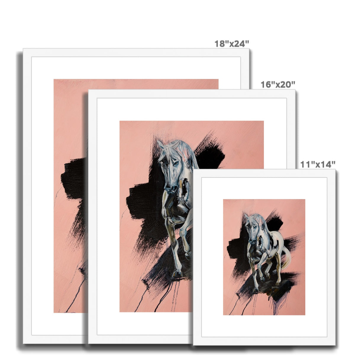 3 different sizes of White horse trotting towards you, pink background with black splash portrait. Framed and mounted print with white frame