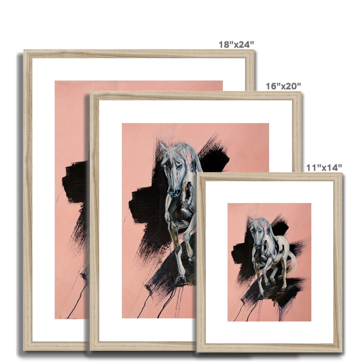 3 different sizes of White horse trotting towards you, pink background with black splash portrait. Framed and mounted print with wood look frame